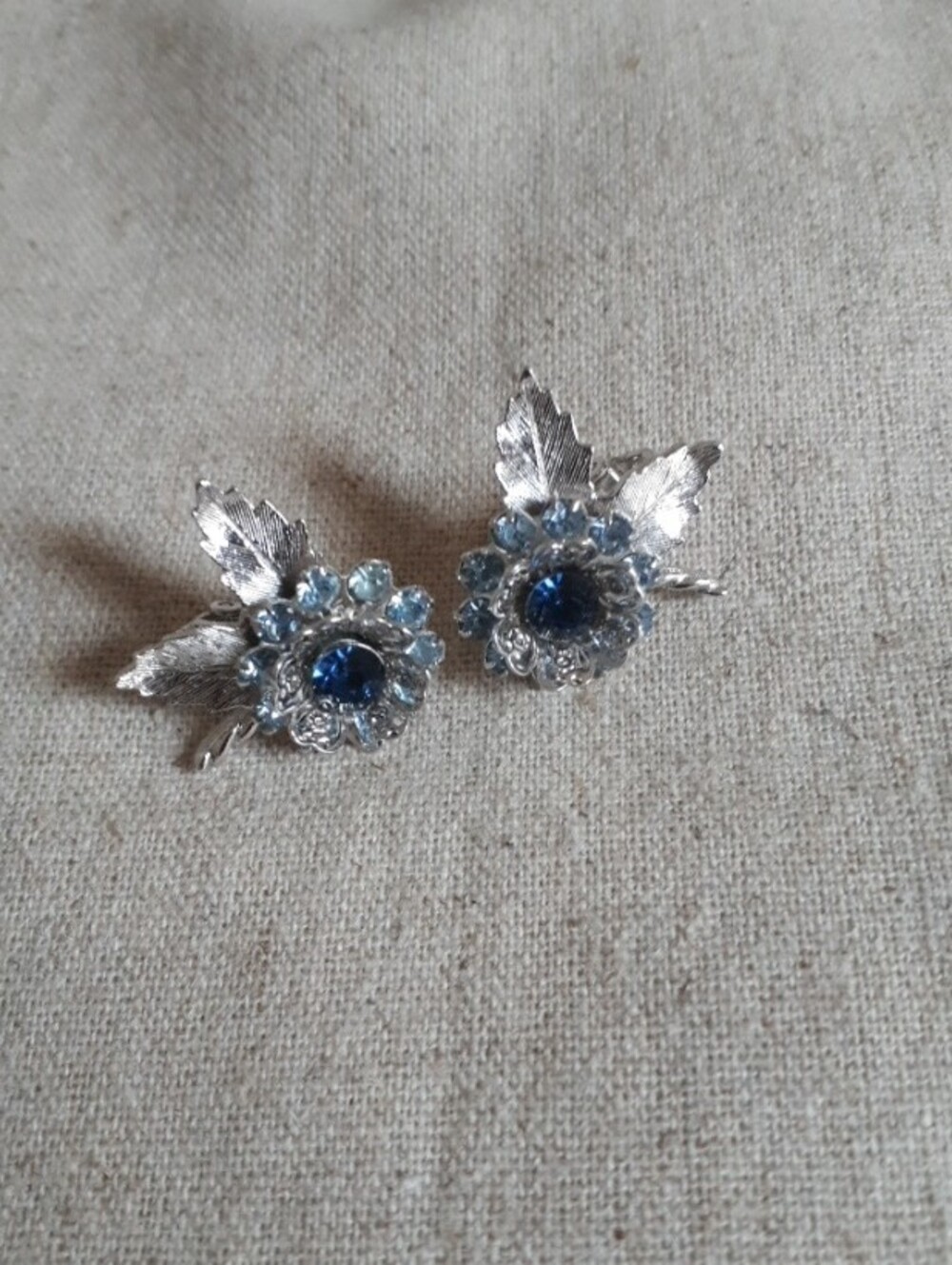 Vintage Sarah Coventry Floral Clip-on Earrings with Blue Center Stones